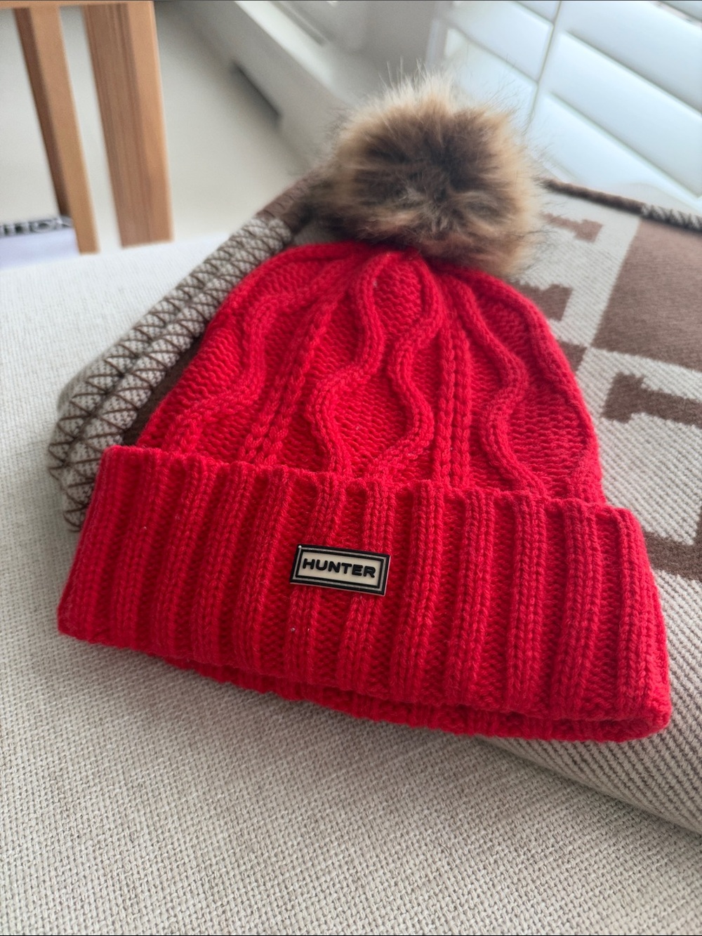 Hunter Red Cable-Knit Beanie with Brown Faux-Fur Pom